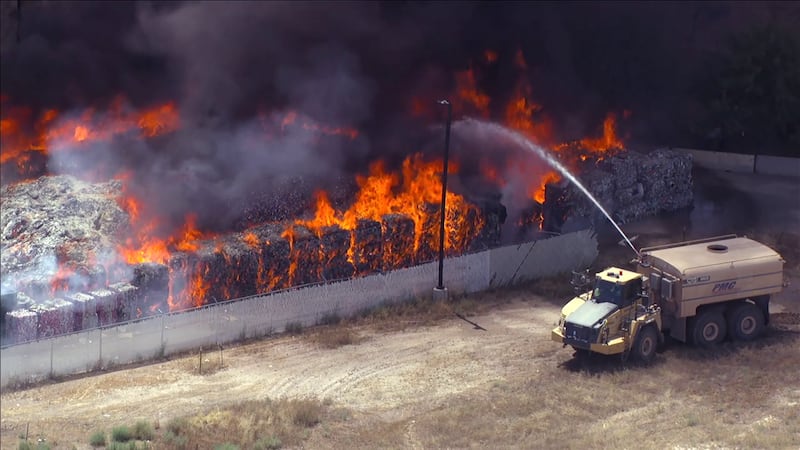 Dozens of firefighters from several agencies are battling a massive landfill fire in Surprise...