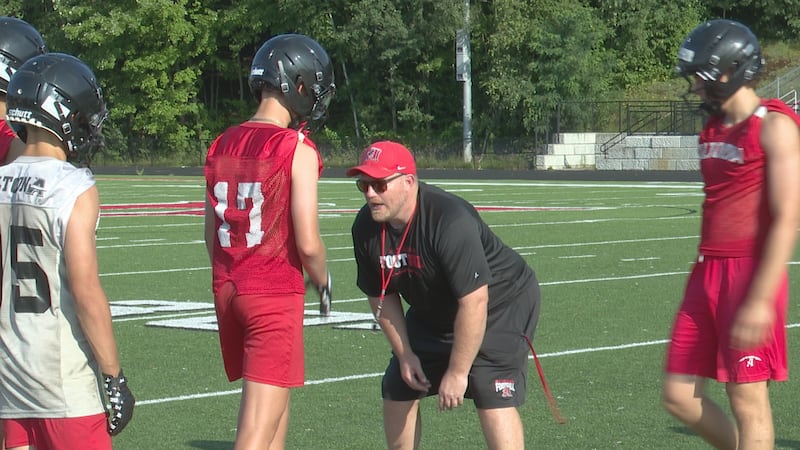 Altoona football's new head coach Kellen Lager works with his team on day two of the 2026 season.