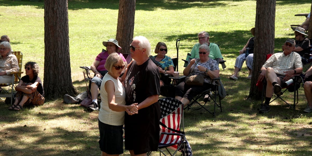 Crowd gathers for music on the lawn in Carson Park