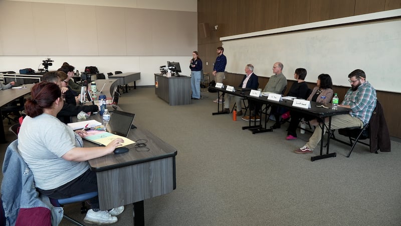 Eau Claire School Board candidates speak with residents at UW-Eau Claire