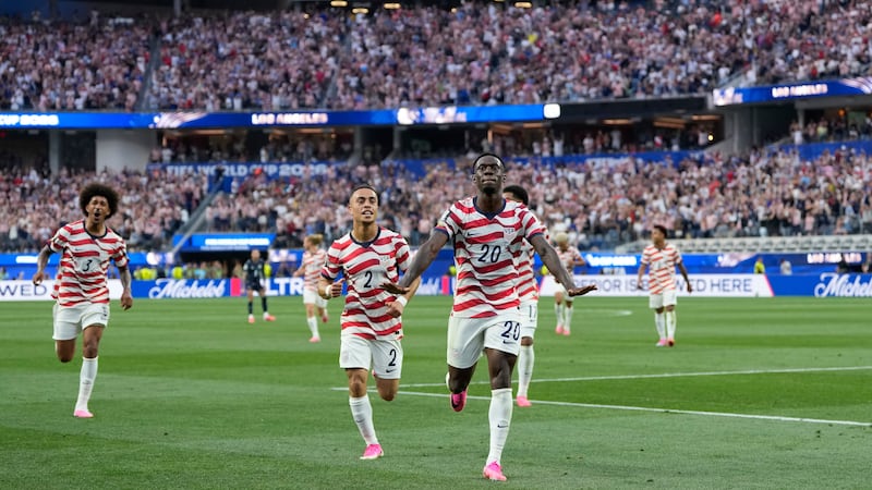 United States' Folarin Balogun (20) celebrates scoring his side's third goal against Paraguay...